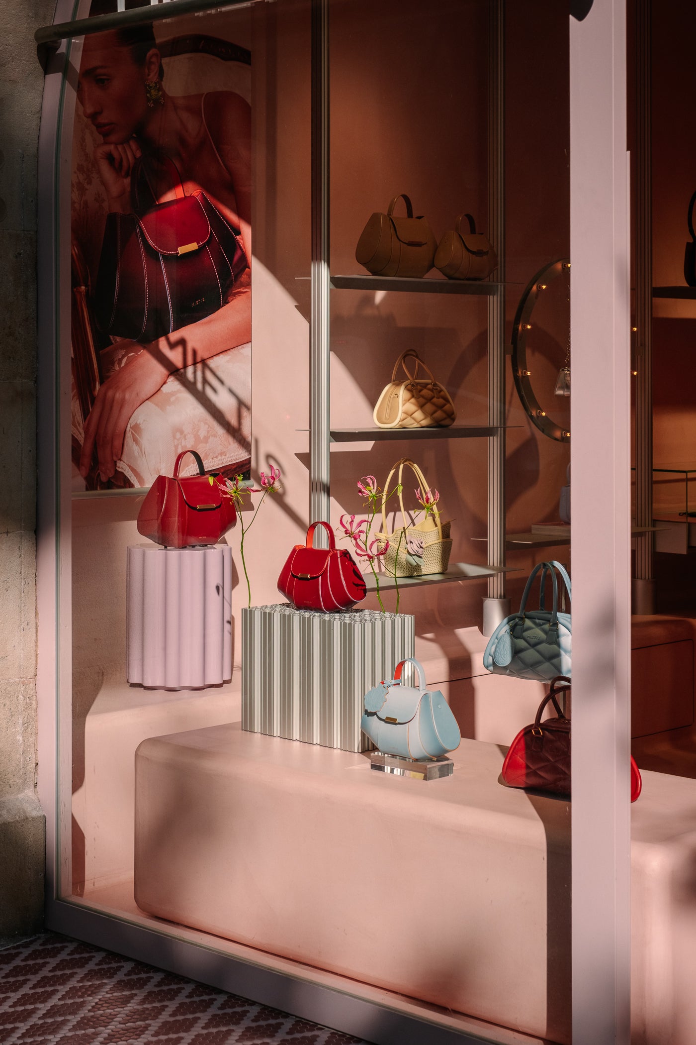 Handbag design layout featuring premium hardware options and colorful leather samples at the Mietis Barcelona studio.