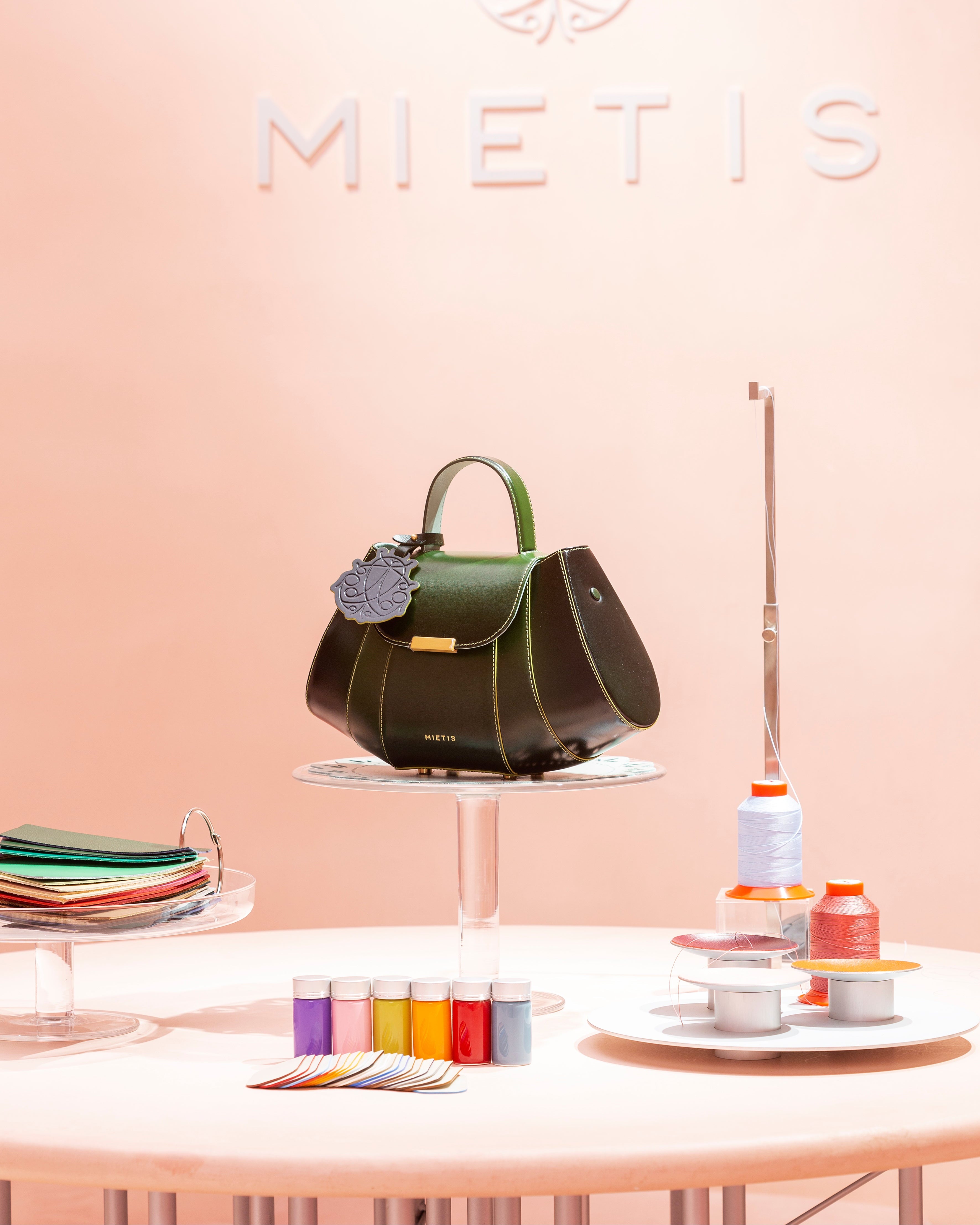 One on one luxury fashion consultation for designing a personalized made to order leather bag in Spain.