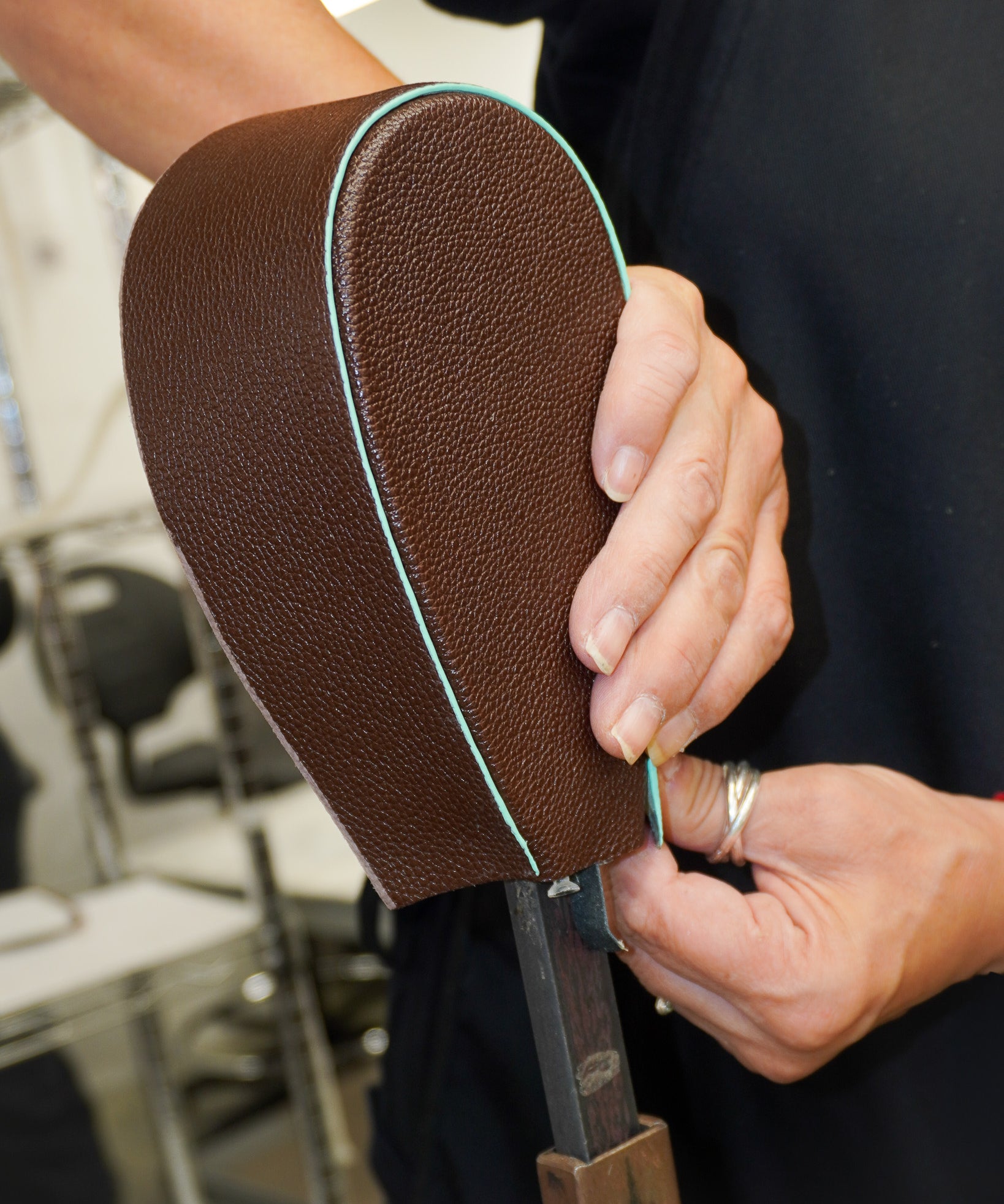 Painting the leather edges by hand – MIETIS ROOTED craft