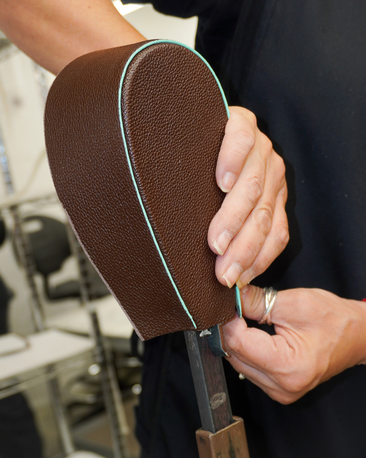 Painting the leather edges by hand – MIETIS ROOTED craft