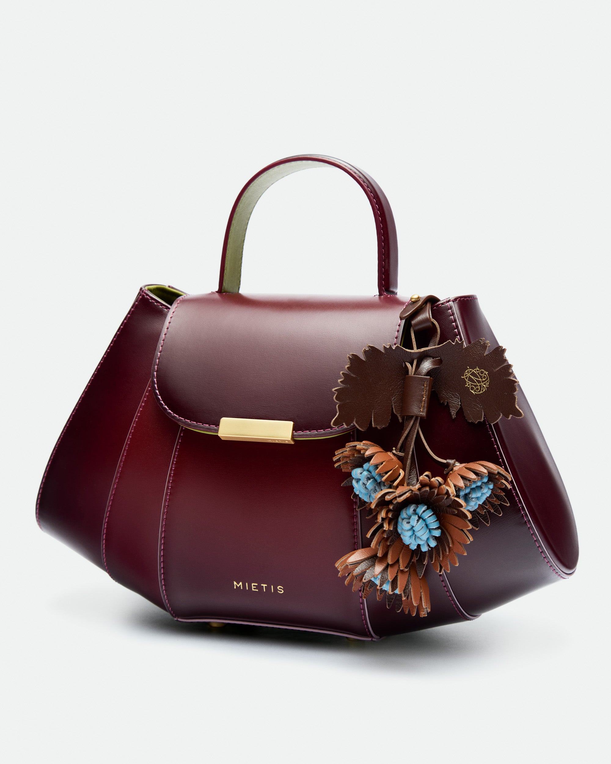 Tatito Cherry Lacquer Fumée leather bag – MIETIS ROOTED Fall.Winter 2026 – 01